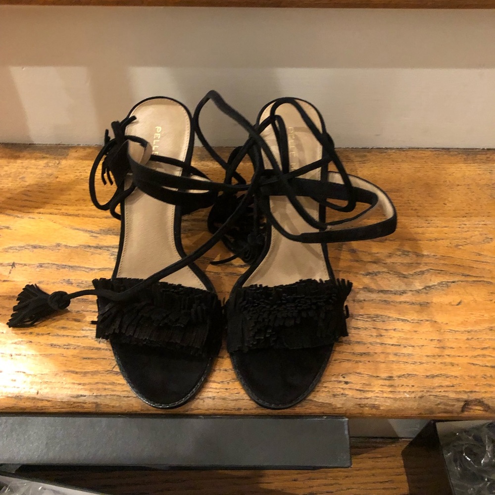 Frill block heel sandal.